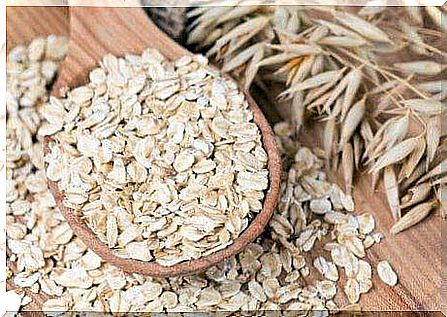 wooden spoon with oats