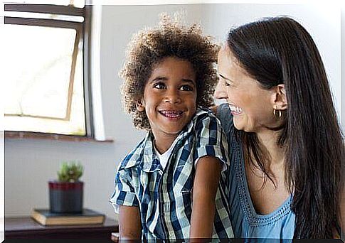 mother and son laughing together