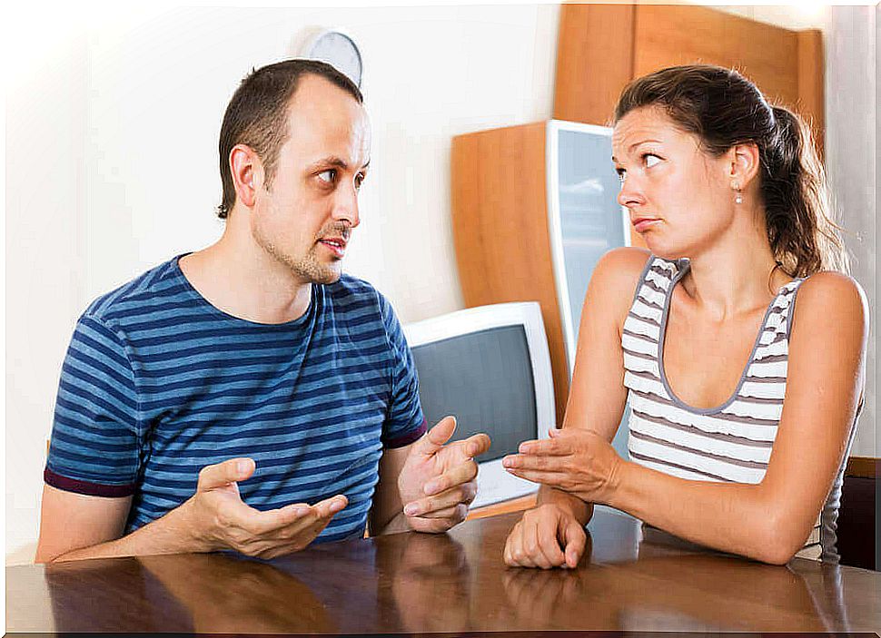 man and woman in unclear conversation