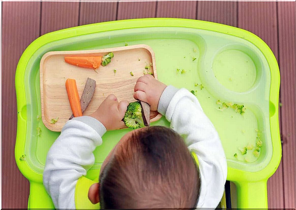 It's ok if a baby wants to play with his food