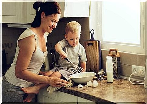 Child helping mother cook