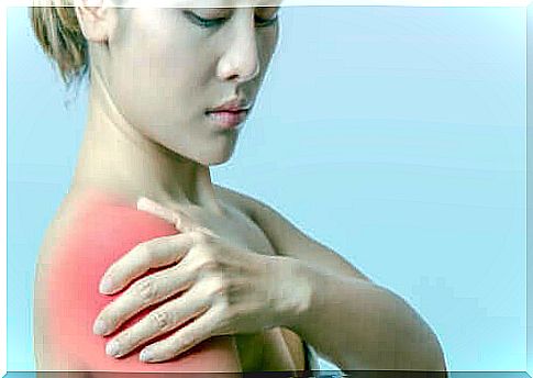 Woman with a sore shoulder