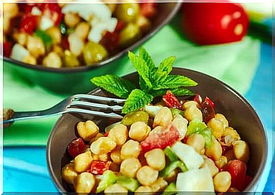 fork in a bowl with salad