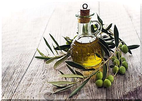 Bottle of olive oil and olives